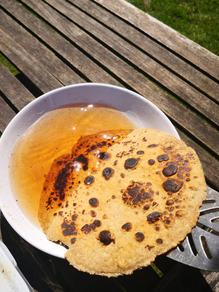 dunking flatbread in water